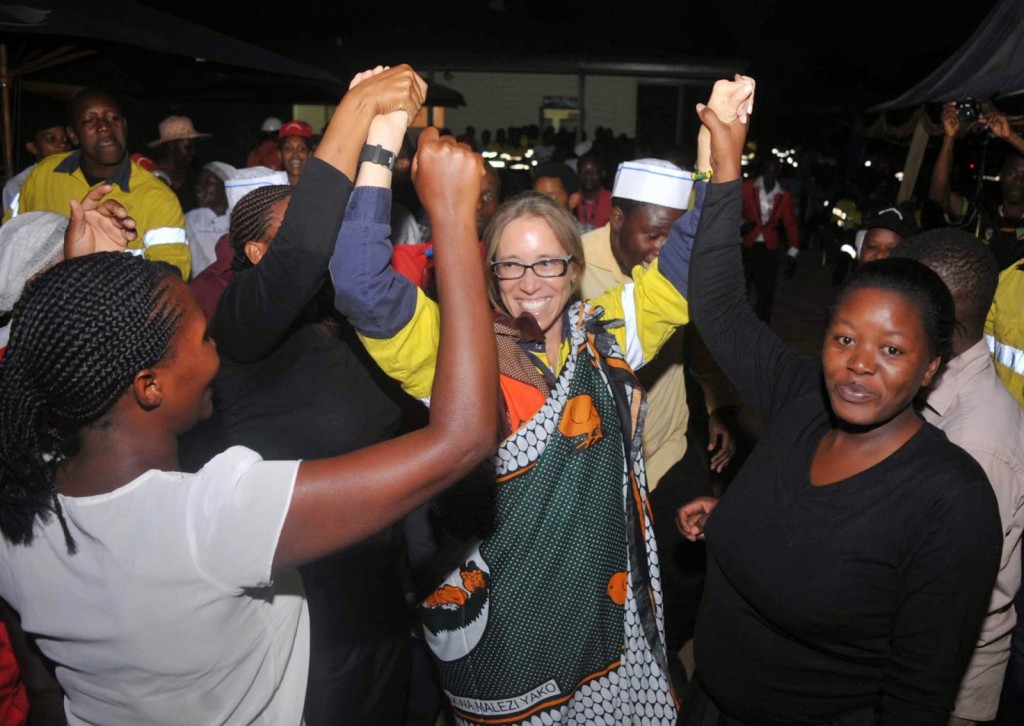 Tanzanian workers celebrate an acceptable foreign  investor