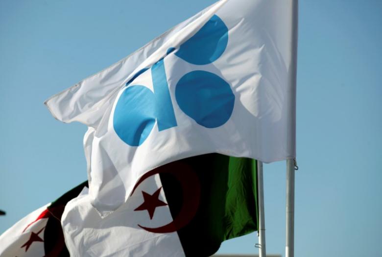 The OPEC and Algeria flags are pictured ahead of an informal meeting between members of the Organization of the Petroleum Exporting Countries (OPEC) in Algiers, Algeria September 28, 2016. REUTERS/Ramzi Boudina